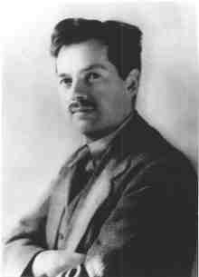 Portrait image of Eric Valentine Gordon wearing a jacket and tie.
