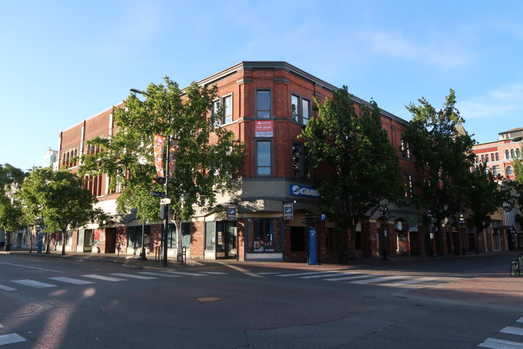 The brick building, formerly the King Edward Hotel, at the corner of Yates and Broad Streets, Victoria, B.C.