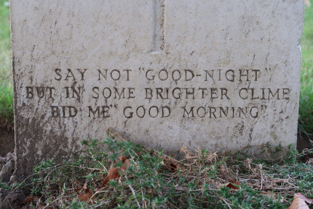 The inscription on the Commonwealth War Graves Commission headstone is at the base of the tablet.