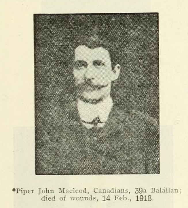 Portrait image of Piper John MacLeod who is sporting a fine and wide handle-bar mustache. He wears a jacket, high collar and tie.