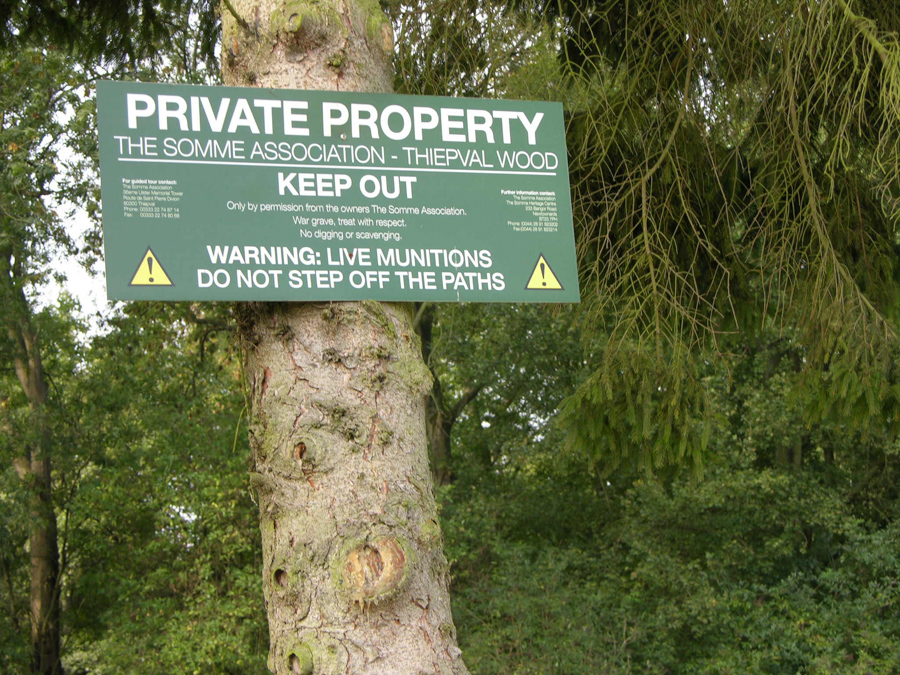 Warning sign attached to a tree, Somme