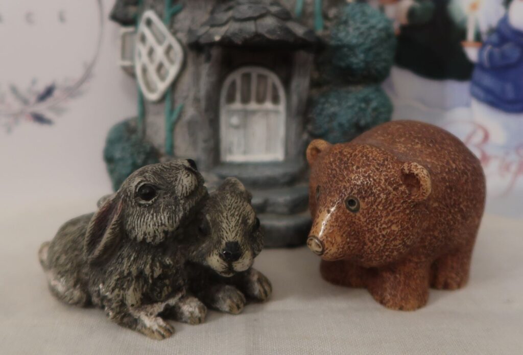 A bear has arrived to help his rabbit friends.